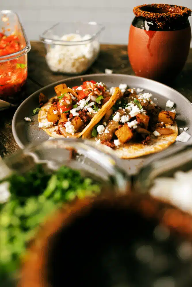 You're going to love this easy-to-follow Chorizo Potato Tacos. Spicy chorizo and hearty potatoes, inside a soft corn tortilla! 