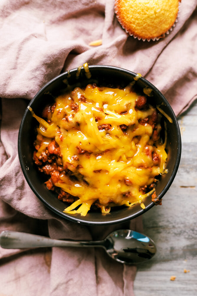 Spicy Slow Cooker chili that can be made in a crockpot or in the oven low and slow. Added heat from serrano and jalapeno peppers and yes - this chili had beans in it!