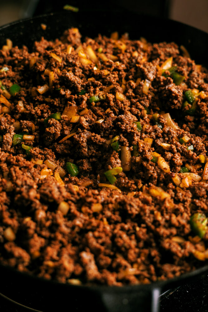 Spicy Slow Cooker chili that can be made in a crockpot or in the oven low and slow. Added heat from serrano and jalapeno peppers and yes - this chili had beans in it!