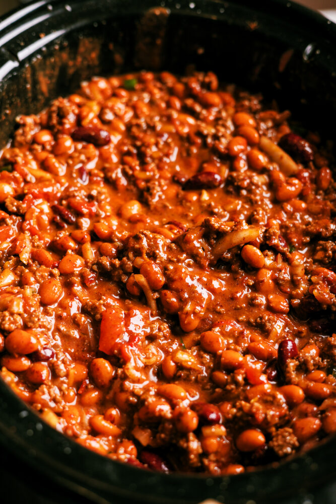 Spicy Slow Cooker chili that can be made in a crockpot or in the oven low and slow. Added heat from serrano and jalapeno peppers and yes - this chili had beans in it!